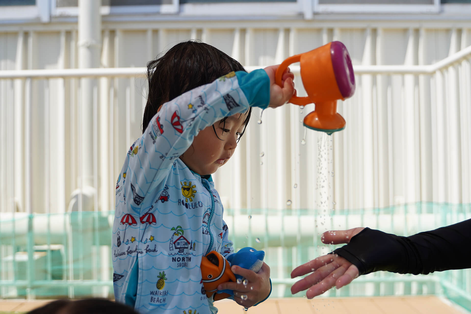 Pouring water on the teacher!