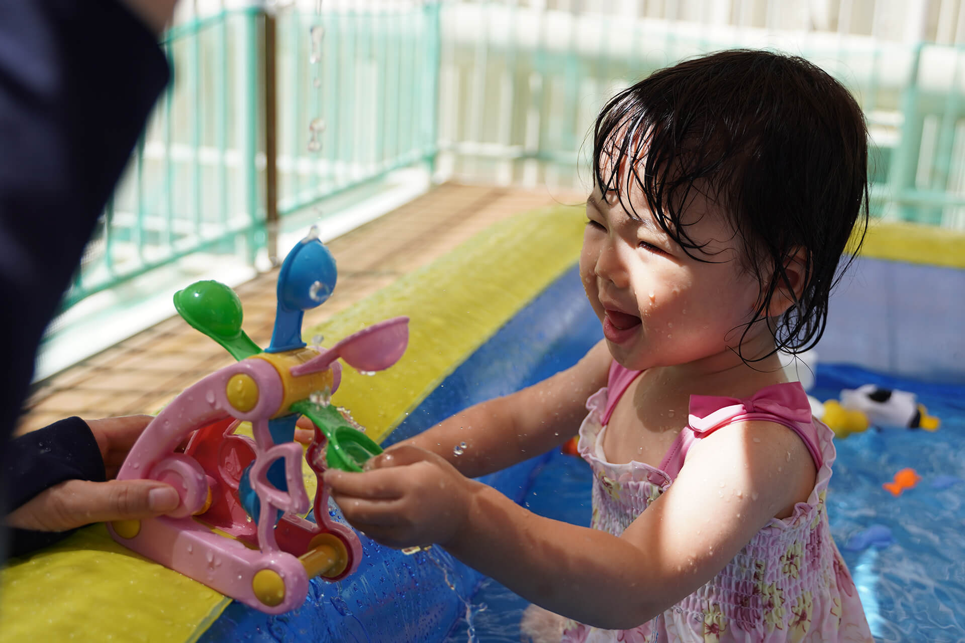 It's a water wheel, but it's more fun to turn it by hand.